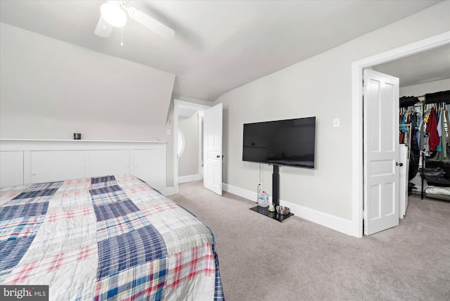 bedroom with carpet, baseboards, and a ceiling fan