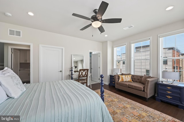 bedroom featuring recessed lighting, visible vents, and dark wood-type flooring
