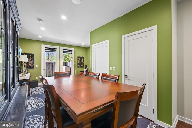 dining room featuring recessed lighting and baseboards