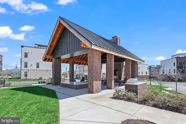 surrounding community featuring a gazebo and a yard