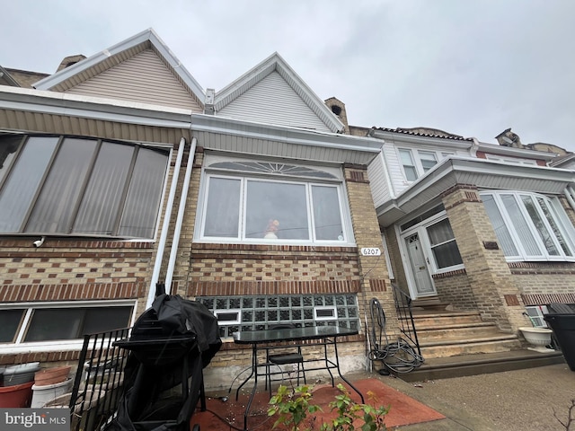 6207 Gardenia St, Philadelphia, PA 19144 - view of front facade featuring brick siding and entry steps