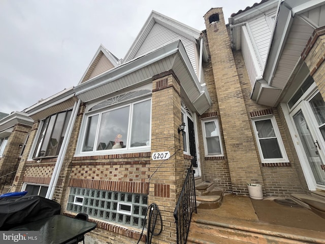 6207 Gardenia St, Philadelphia, PA 19144 - view of side of home with entry steps and brick siding