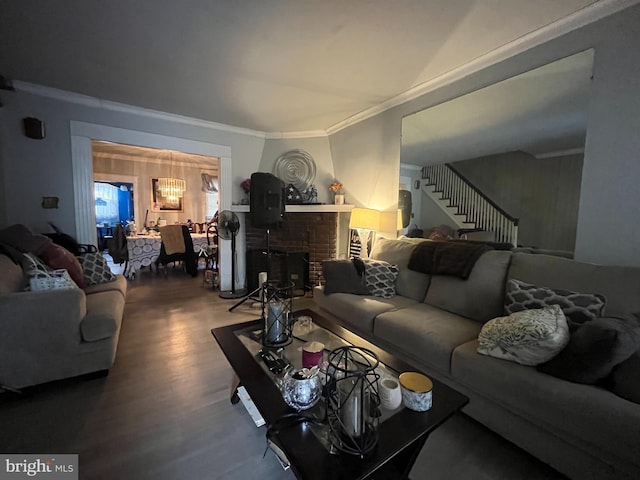 6207 Gardenia St, Philadelphia, PA 19144 - living room with ornamental molding, a fireplace, wood finished floors, and stairs