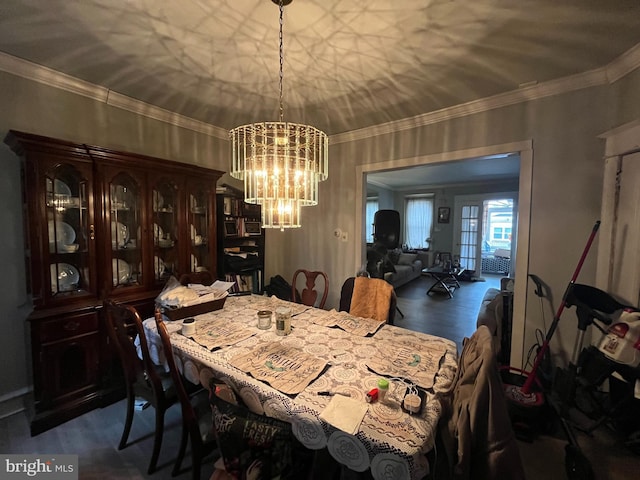 6207 Gardenia St, Philadelphia, PA 19144 - dining space with a chandelier, crown molding, and wood finished floors