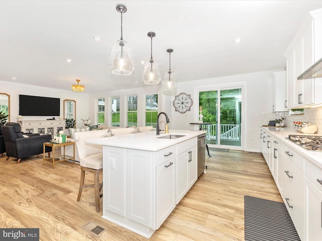 704 Kaplon Ct, Brunswick, MD 21716 - kitchen featuring appliances with stainless steel finishes, a sink, light countertops, white cabinetry, and recessed lighting