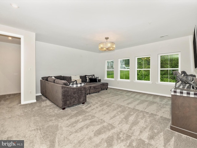 704 Kaplon Ct, Brunswick, MD 21716 - living area featuring carpet, baseboards, and a chandelier
