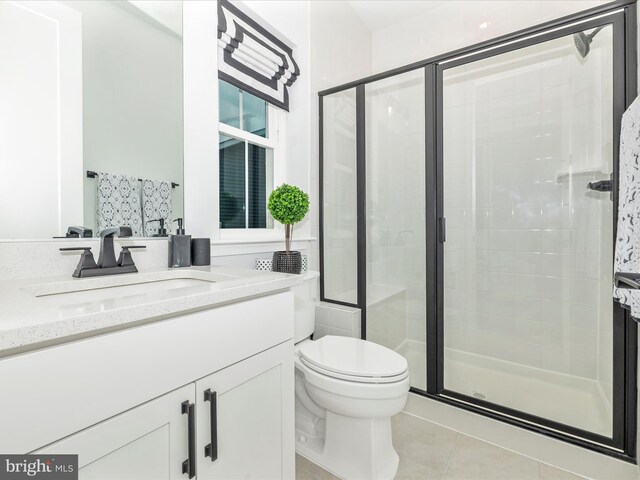 704 Kaplon Ct, Brunswick, MD 21716 - full bath with a stall shower, tile patterned flooring, toilet, and vanity