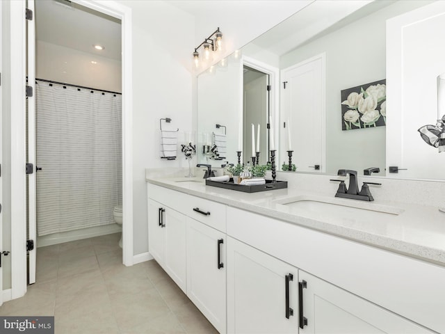 704 Kaplon Ct, Brunswick, MD 21716 - full bathroom featuring tile patterned flooring, toilet, double vanity, and curtained shower