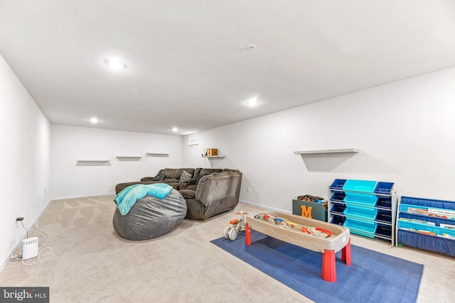 living room with baseboards, recessed lighting, and carpet