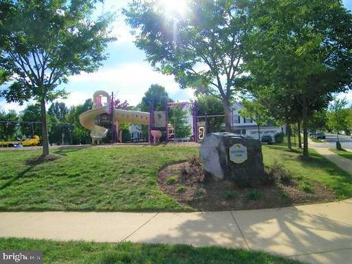 20347 Bowfonds St, Ashburn, VA 20147 - view of home's community featuring a yard and playground community