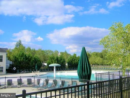 20347 Bowfonds St, Ashburn, VA 20147 - pool with fence and a patio area