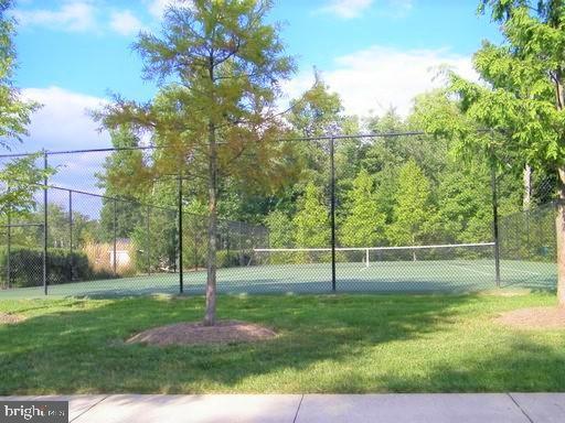 20347 Bowfonds St, Ashburn, VA 20147 - view of sport court with fence and a yard
