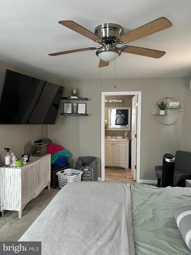 110 Woodland Ave, Norwood, PA 19074 - bedroom with baseboards, a sink, a ceiling fan, and ensuite bath