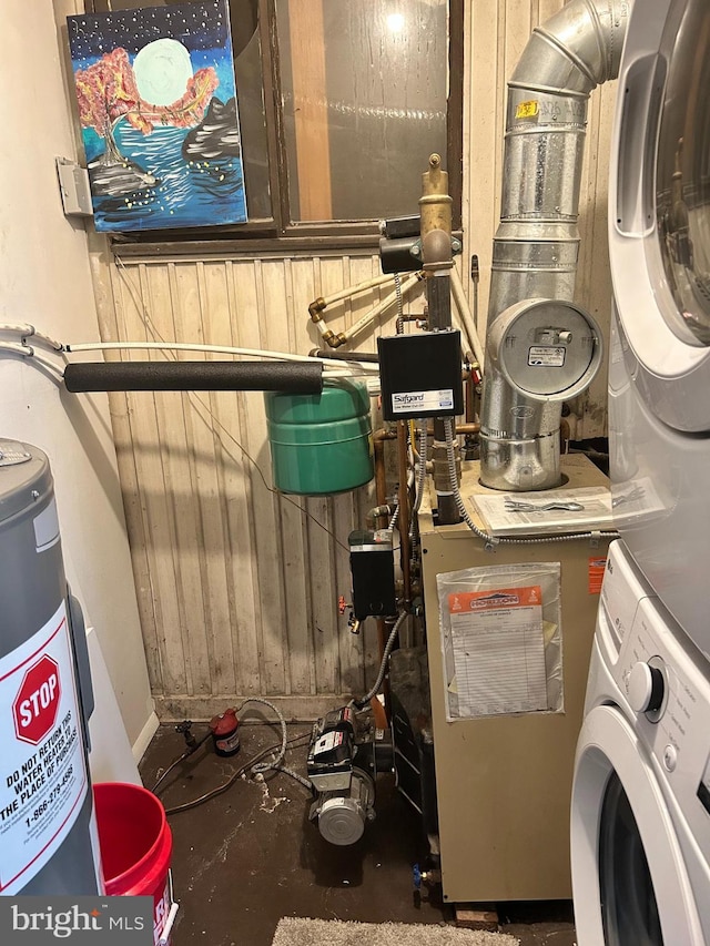 110 Woodland Ave, Norwood, PA 19074 - utility room featuring stacked washing maching and dryer