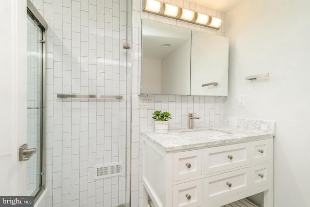 2625 Pratt St, Philadelphia, PA 19137 - full bathroom with tasteful backsplash, vanity, and a shower with door