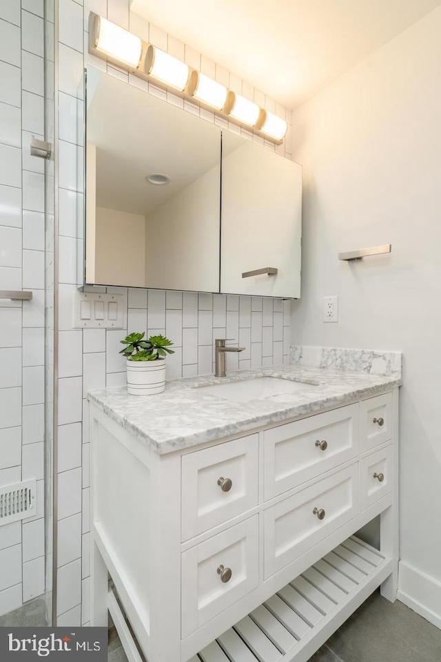 2625 Pratt St, Philadelphia, PA 19137 - bathroom featuring vanity and backsplash
