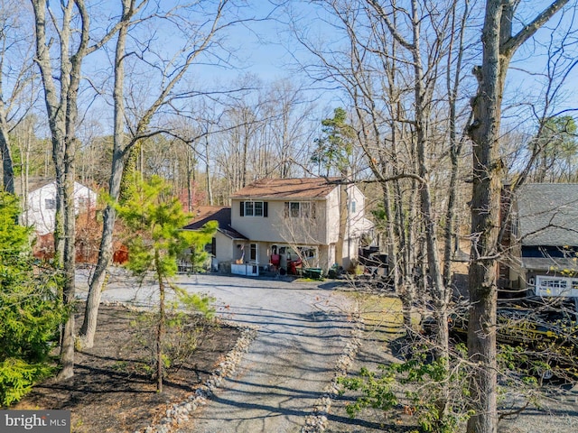 view of front of house featuring driveway and stucco siding