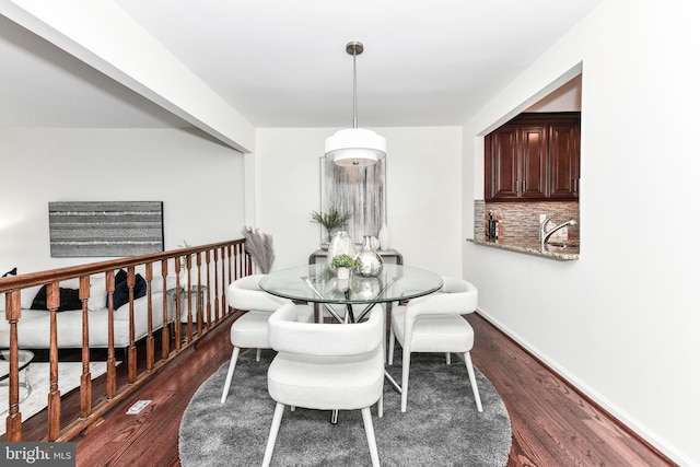 9644 Sutton Green Ct, Vienna, VA 22181 - dining area with dark wood finished floors and baseboards