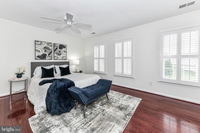 9644 Sutton Green Ct, Vienna, VA 22181 - bedroom featuring multiple windows, wood finished floors, and baseboards