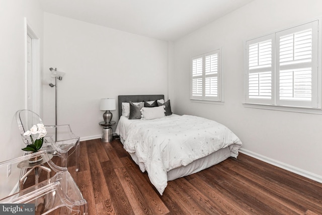 9644 Sutton Green Ct, Vienna, VA 22181 - bedroom with baseboards and wood finished floors