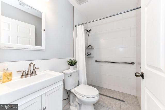 9644 Sutton Green Ct, Vienna, VA 22181 - bathroom featuring toilet, vanity, and a tile shower