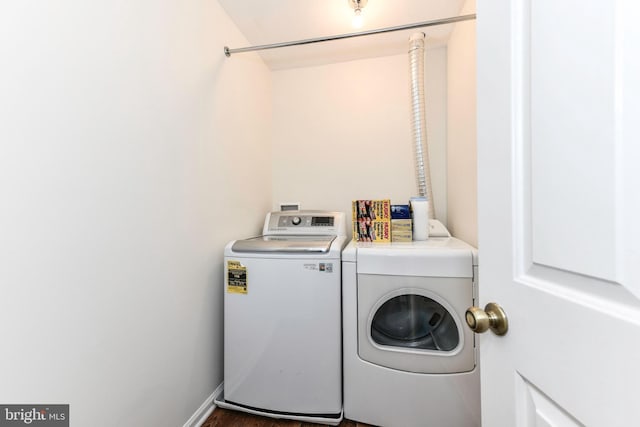 9644 Sutton Green Ct, Vienna, VA 22181 - washroom featuring separate washer and dryer, baseboards, and wood finished floors
