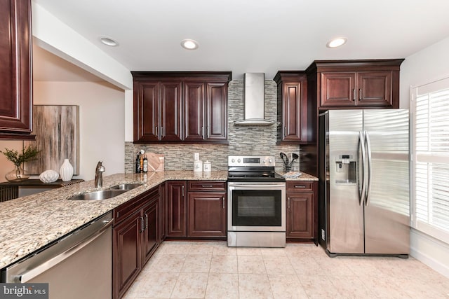 9644 Sutton Green Ct, Vienna, VA 22181 - kitchen with appliances with stainless steel finishes, wall chimney range hood, a sink, decorative backsplash, and recessed lighting