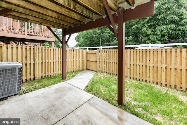 9644 Sutton Green Ct, Vienna, VA 22181 - fenced backyard featuring central air condition unit, a patio area, and a gate