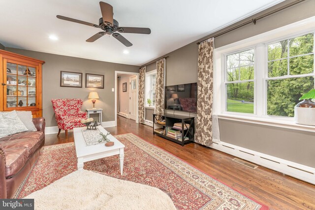 90 Indiantown Rd, Glenmoore, PA 19343 - living area with a ceiling fan, baseboards, wood finished floors, recessed lighting, and a baseboard radiator