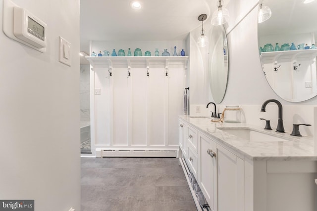 90 Indiantown Rd, Glenmoore, PA 19343 - full bath featuring a baseboard heating unit, recessed lighting, double vanity, and concrete floors