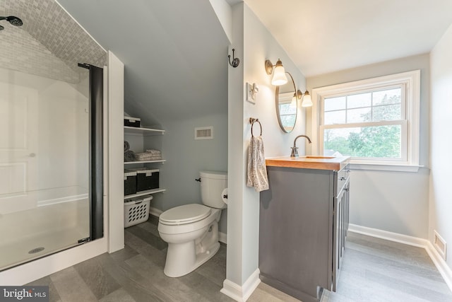 90 Indiantown Rd, Glenmoore, PA 19343 - bathroom with a shower stall, lofted ceiling, vanity, toilet, and baseboards