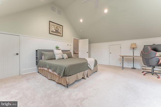 90 Indiantown Rd, Glenmoore, PA 19343 - carpeted bedroom featuring vaulted ceiling, a wainscoted wall, and a decorative wall