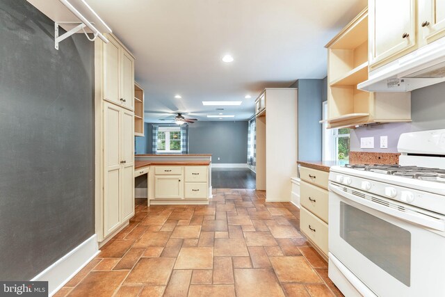 90 Indiantown Rd, Glenmoore, PA 19343 - kitchen featuring white gas range, open shelves, cream cabinets, baseboards, and recessed lighting