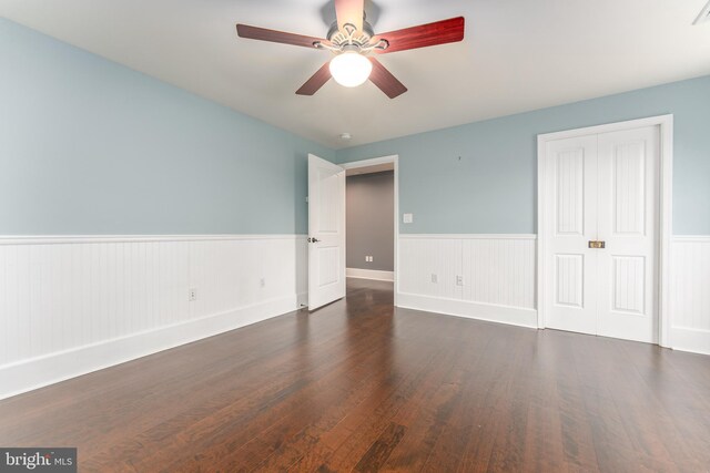 90 Indiantown Rd, Glenmoore, PA 19343 - unfurnished bedroom with wainscoting, wood finished floors, a closet, and a ceiling fan