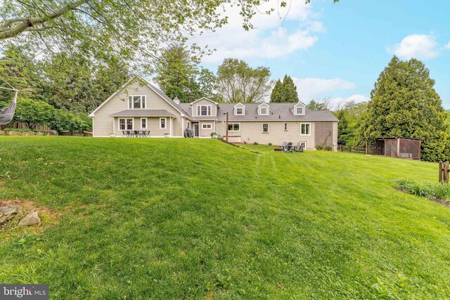 90 Indiantown Rd, Glenmoore, PA 19343 - back of property with a lawn and an outdoor structure