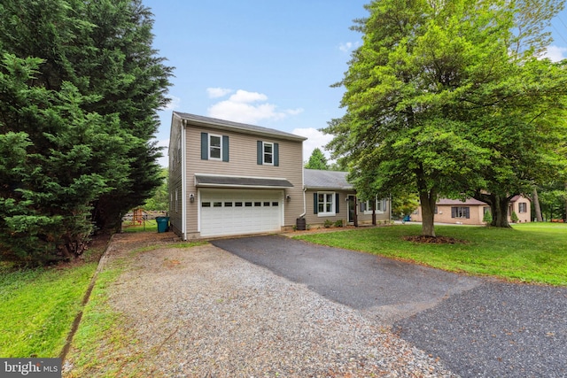 5939 Meadow Rd, Frederick, MD 21701 - traditional home with a garage, driveway, and a front lawn