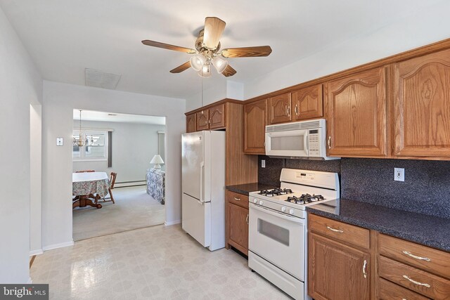 17 Hyannis St, Toms River, NJ 08757 - kitchen featuring brown cabinets, backsplash, visible vents, white appliances, and ceiling fan with notable chandelier