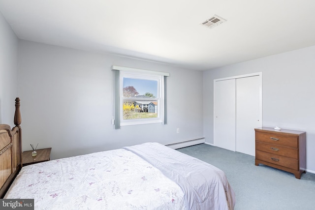 17 Hyannis St, Toms River, NJ 08757 - carpeted bedroom with a baseboard heating unit, a closet, and visible vents