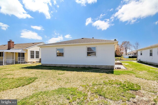 17 Hyannis St, Toms River, NJ 08757 - rear view of property featuring a yard