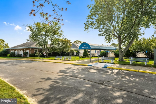 17 Hyannis St, Toms River, NJ 08757 - view of front facade featuring a front lawn and uncovered parking