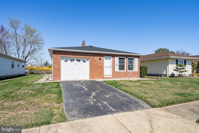 17 Hyannis St, Toms River, NJ 08757 - single story home with a chimney, driveway, an attached garage, a front yard, and brick siding