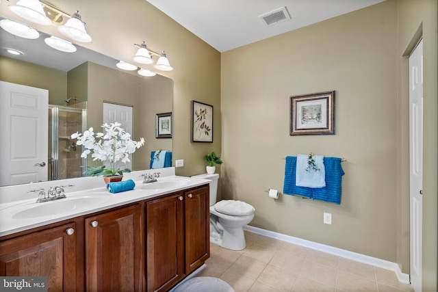 207 Secretariat Dr Unit M, Havre De Grace, MD 21078 - full bath with double vanity, a shower stall, tile patterned flooring, toilet, and baseboards