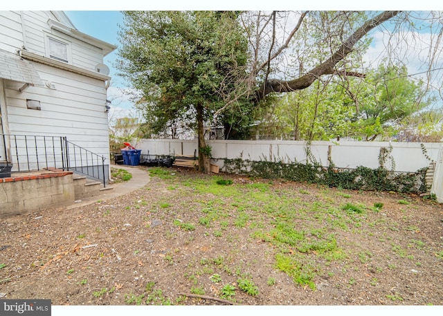 view of yard featuring fence
