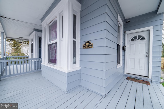 deck with covered porch