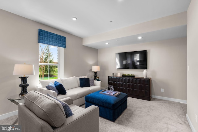 living area with baseboards, carpet, and recessed lighting