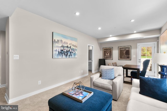 living area with light colored carpet, baseboards, and recessed lighting