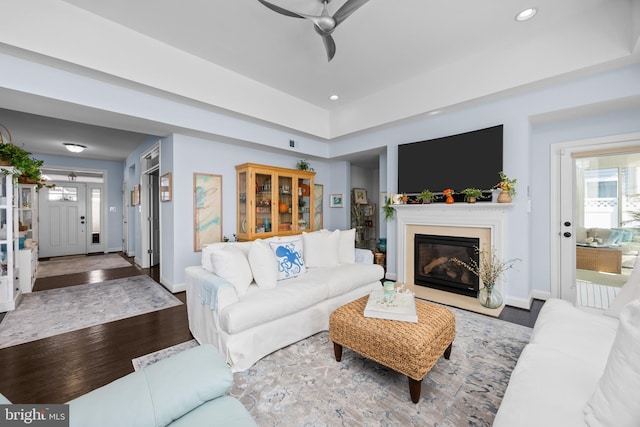 34851 Surfsong Lndg, Millville, DE 19967 - living room with a premium fireplace, baseboards, recessed lighting, and ceiling fan