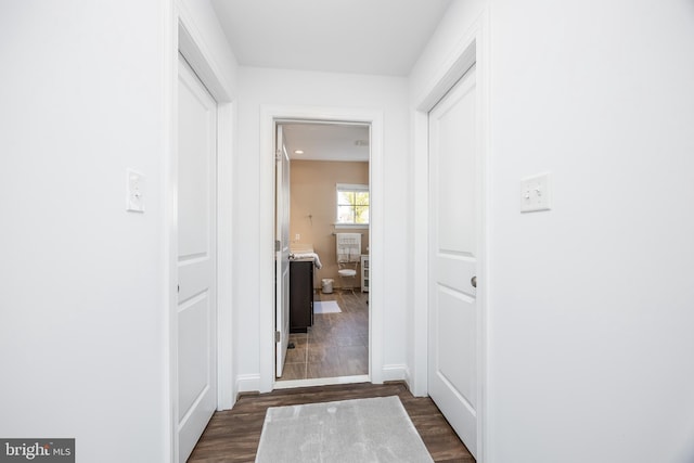 34851 Surfsong Lndg, Millville, DE 19967 - hall featuring baseboards and dark wood-type flooring