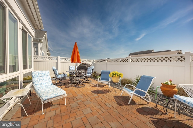 34851 Surfsong Lndg, Millville, DE 19967 - view of patio / terrace with outdoor dining area and a fenced backyard