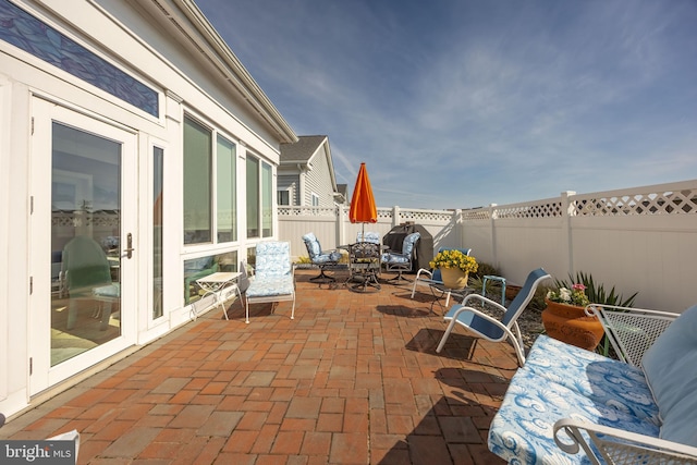 34851 Surfsong Lndg, Millville, DE 19967 - view of patio / terrace with outdoor dining area and a fenced backyard